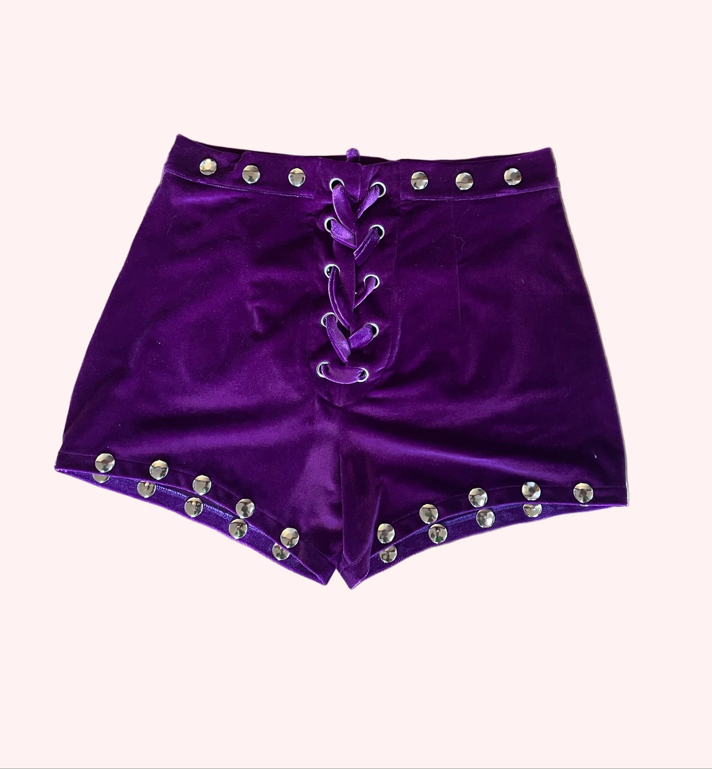 Purple shorts with silver studs and lace up closure