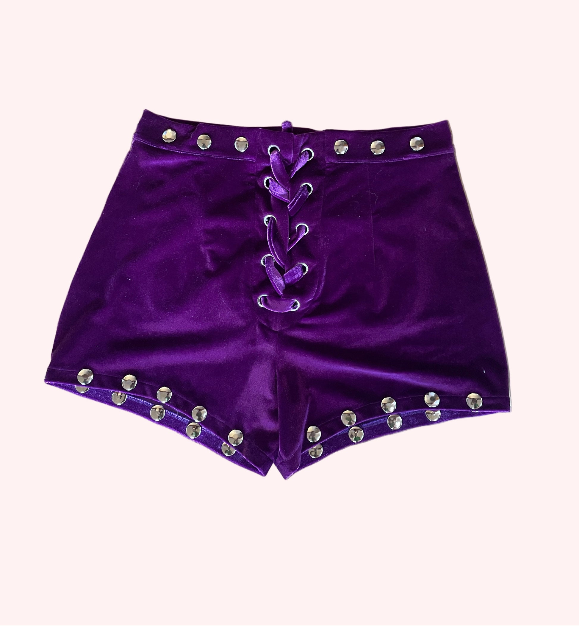 Purple shorts with silver studs and lace up closure