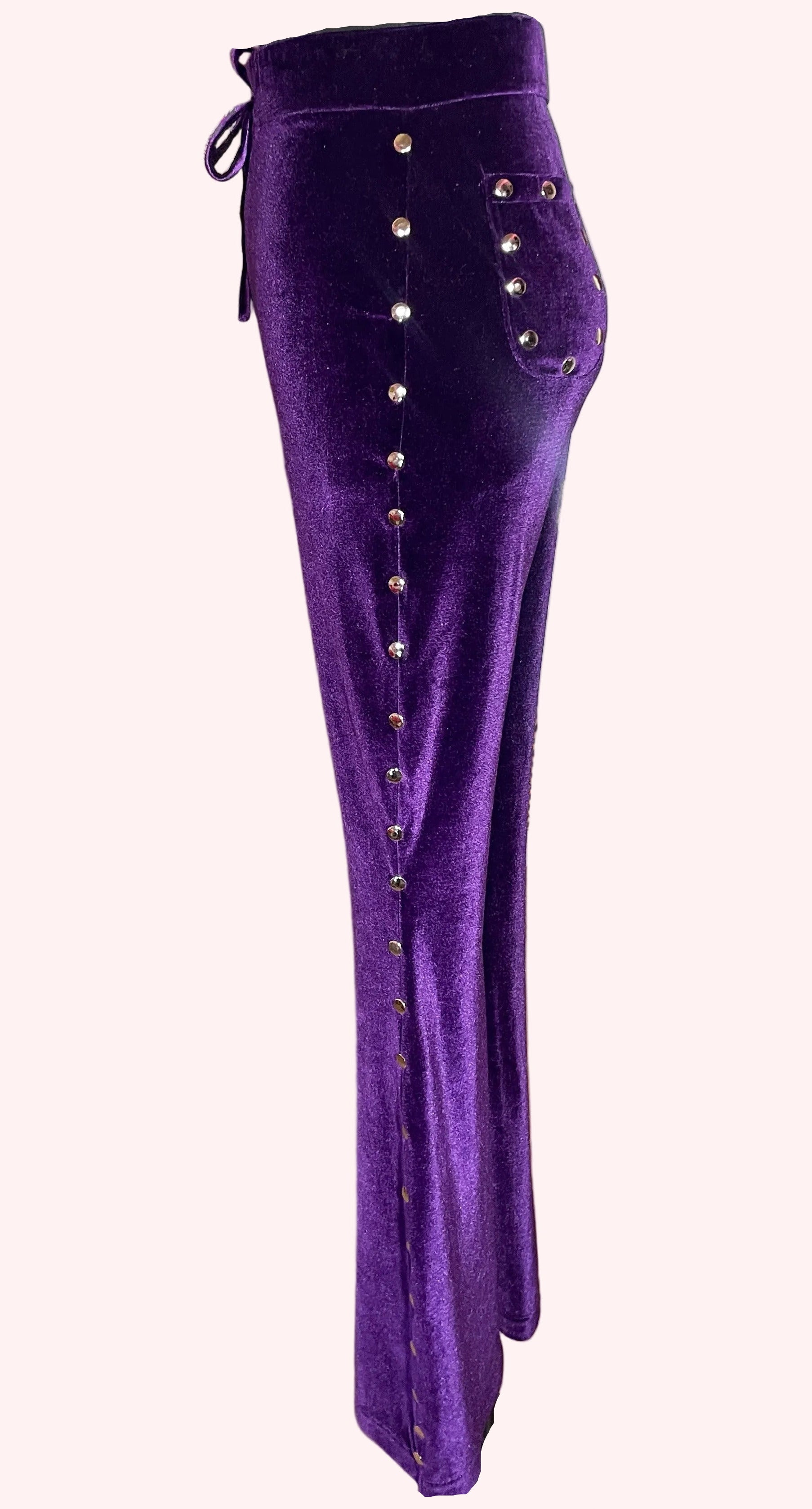 Purple velvet glove with studs down the sides